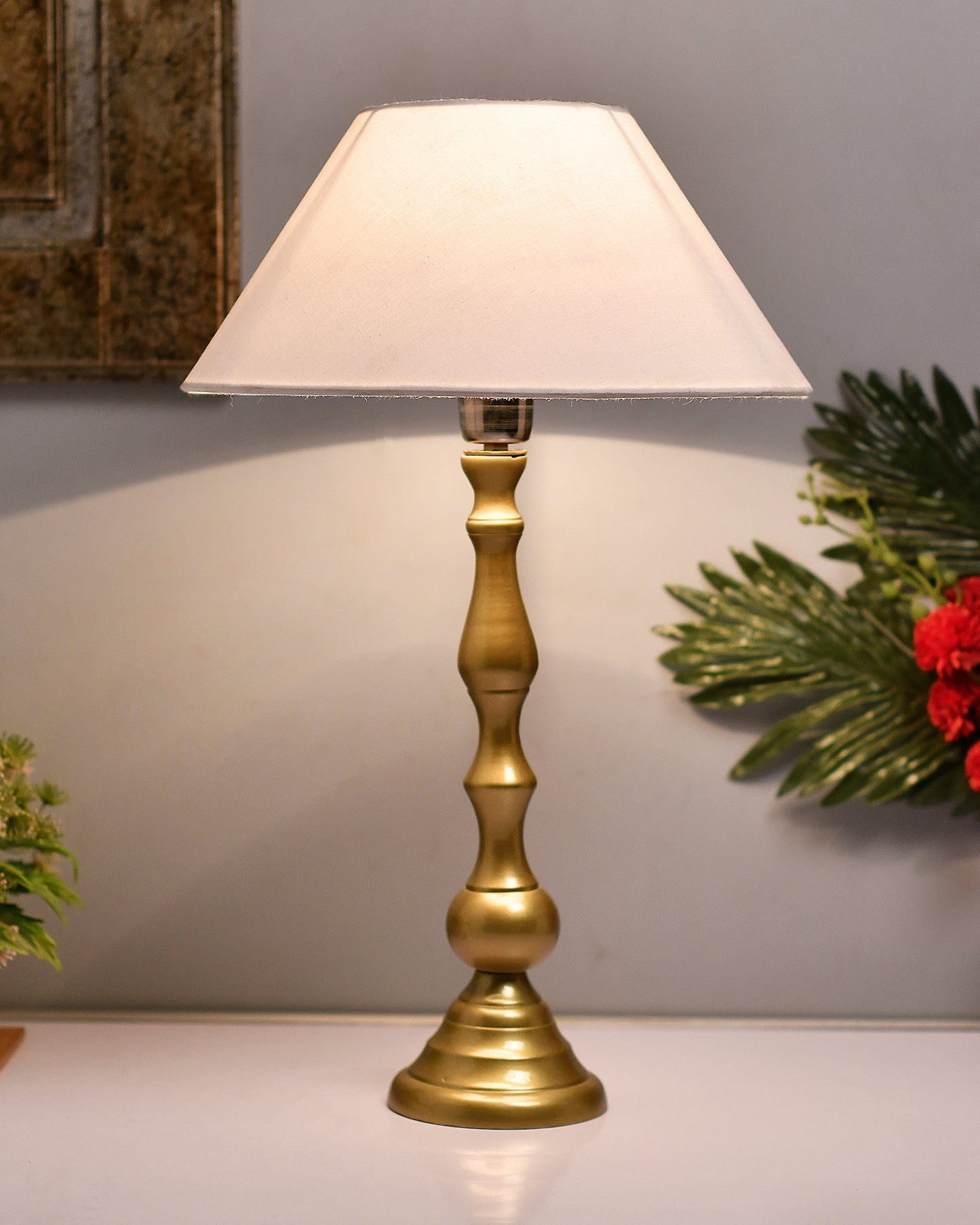 Teardrop gold brushed lamp with shade