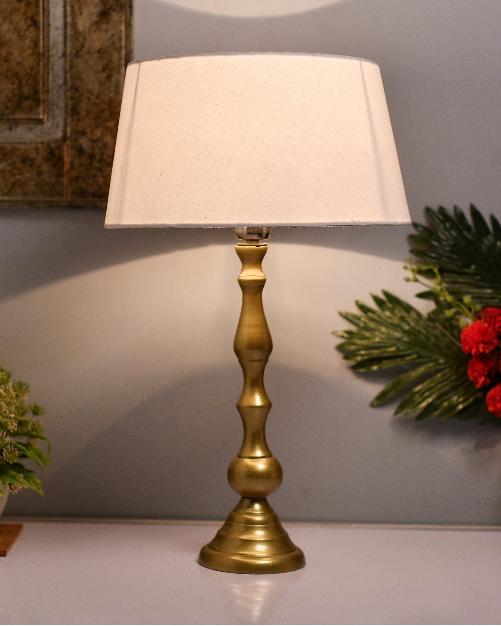 Teardrop gold brushed lamp with shade